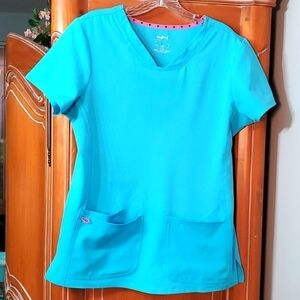 HEARCOMB, women's teal scrub top. Size medium. 3 pockets. Very good used cond.